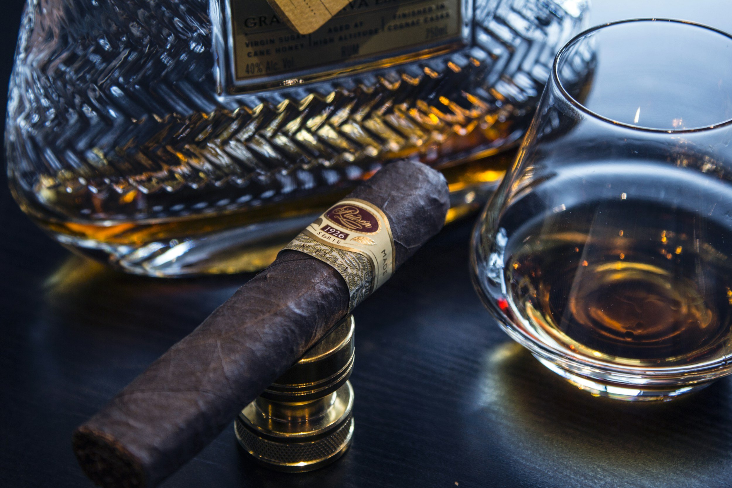 VIP amenities with cigar lounge and whiskey service at corporate retreat venue