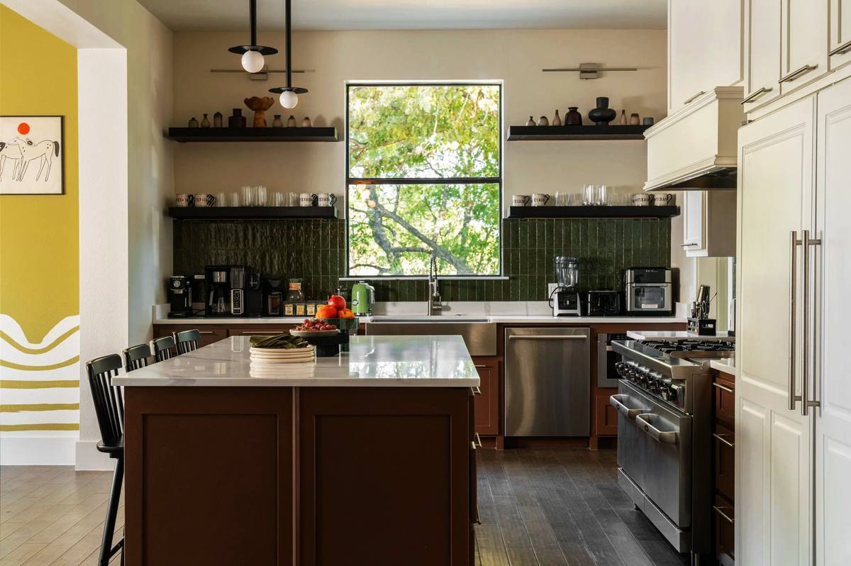 Catering-ready kitchen with green tile and island, The Penrose House